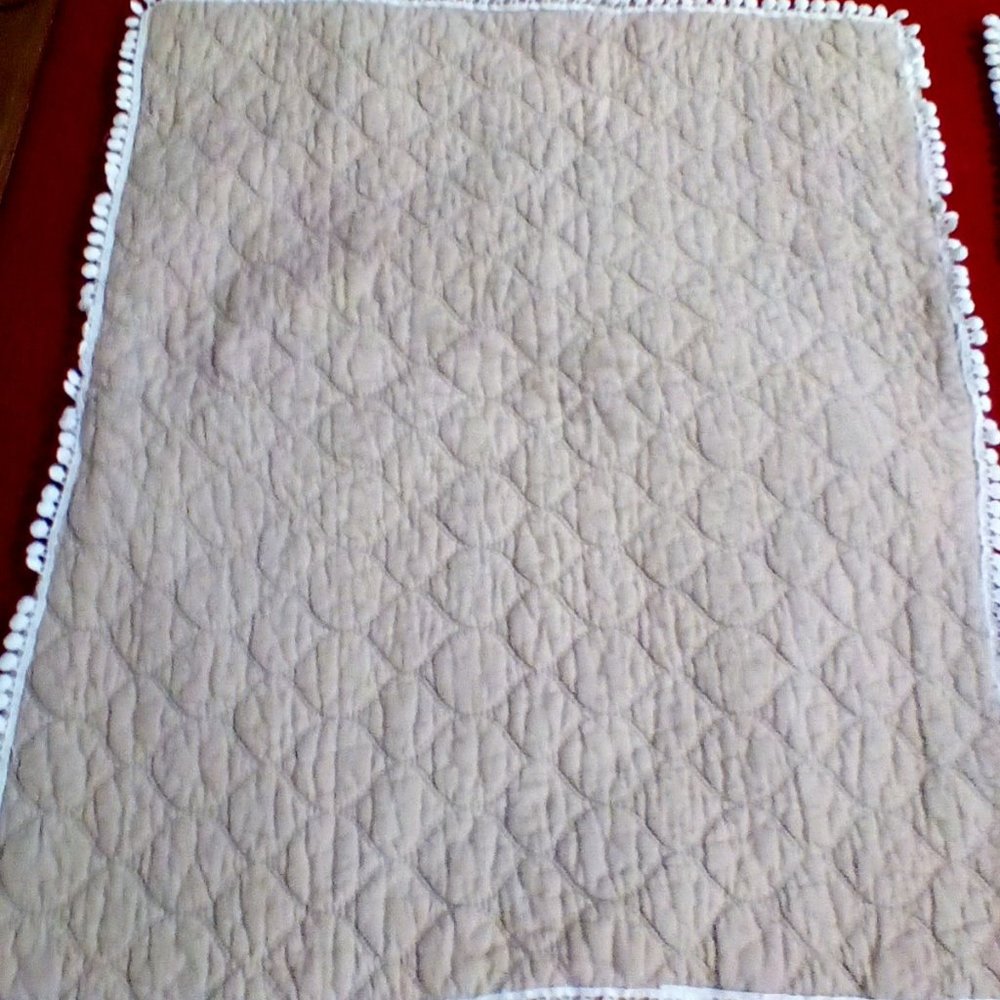 Beige Quilt with White Accents